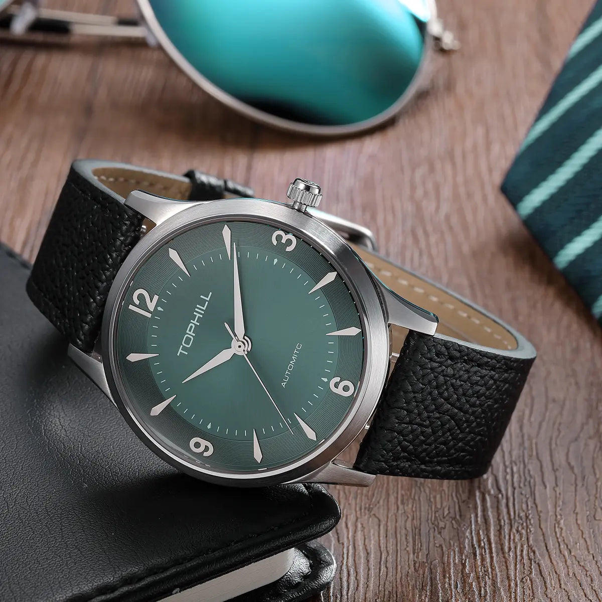 TOPHILL Men's Automatic Mechanical Watch, 42mm 304L Stainless Steel Case, Sunray Dial with Arabic Numerals, Single-Domed Sapphire Crystal, Top Grain Leather Strap, TW111G tophillwatch.com